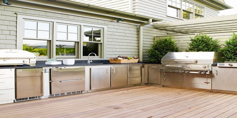 56-Amazing-Outdoor-Kitchen-Designs-with-white-stainless-steel-kitchen-island-sink-oven-stove-grill-machine-window-and-hardwood-floor-and-plant-decor.jpg
